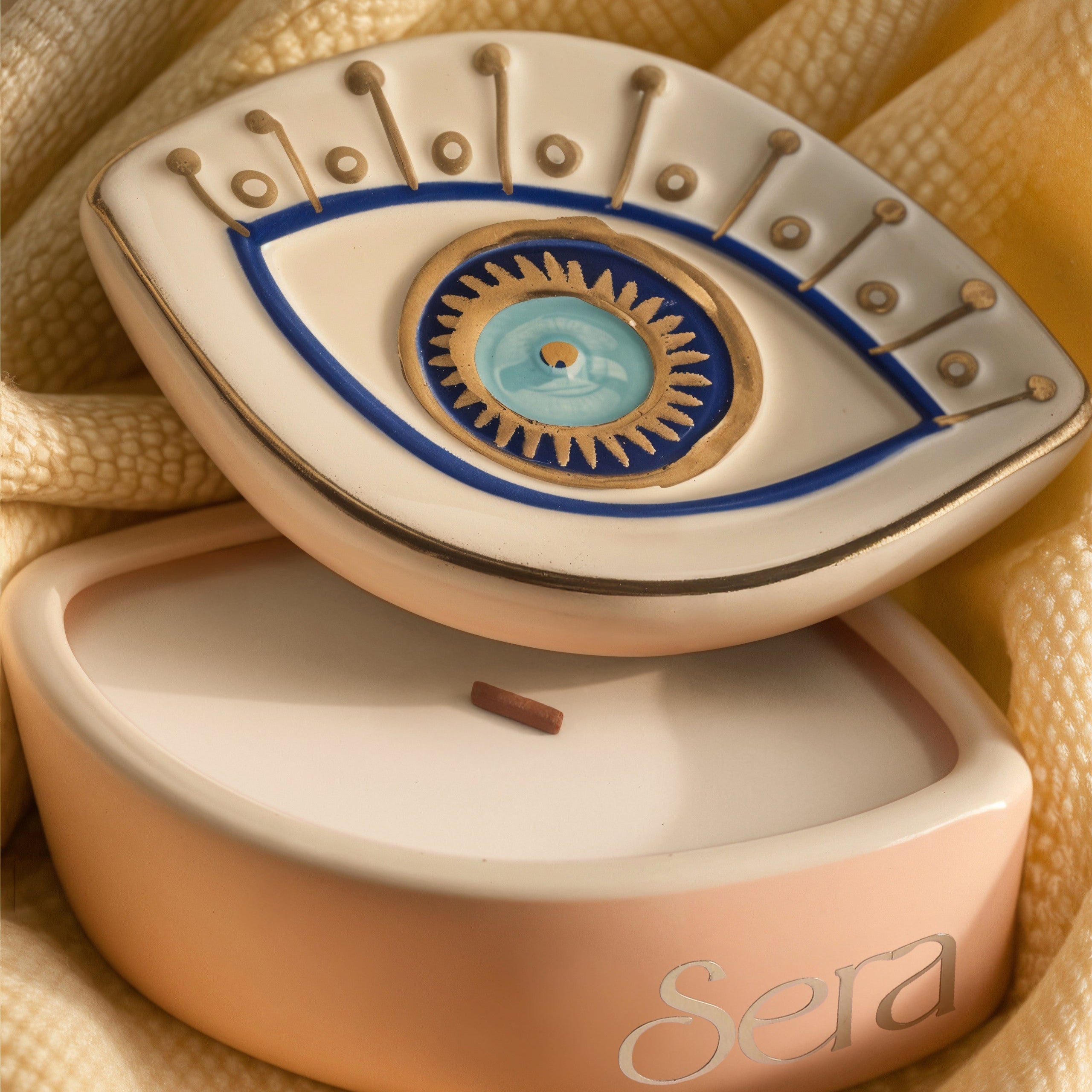 Evil eye candle